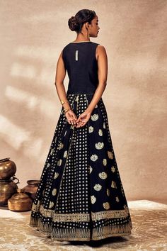 Black kalidar raw silk lehenga with all over Palmscape trinkets foil print and edged with kinari. Paired with a sleeveless V neck koti with gold toned embroidered motifs detailing. - Aza Fashions Kalidar Lehenga, Lehenga And Blouse, Lehenga Pattern, Raw Silk Lehenga, Embroidered Motifs, Only Fashion, Foil Print, Raw Silk, Contemporary Fashion