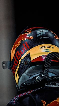 the helmet of a red bull motorcycle rider