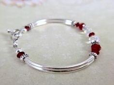 July Birthstone Bracelet: Garnet Birthstone Custom Made | Etsy Adjustable Red Birthstone Bracelet, Adjustable Red Bracelets For Anniversary, Adjustable Red Jewelry For Personalized Gifts, Red Adjustable Jewelry For Personalized Gift, Red Birthstone Jewelry For Birthday, Red Birthstone Jewelry For Birthdays, Nickel-free Red Jewelry For Birthdays, Handmade Red Bracelet For Anniversary, Bracelet Matching