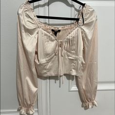 Nwt Forever 21 Medium Satin Ruffled Crop Top In Champagne Forever 21 Feminine Ruffled Tops, Forever 21 Spring Ruffle Blouse, Spring Ruffle Blouse By Forever 21, Spring Ruffled Blouse By Forever 21, Chic Ruffled Blouse From Forever 21, Chic Ruffled Blouse By Forever 21, Elegant Forever 21 Crop Top For Spring, Ruffled Crop Top, Maroon Blouse