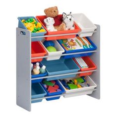 a toy storage unit filled with toys and stuffed animals