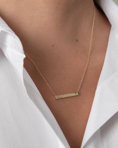 "14K solid gold Bar necklace with a tiny diamond , comes in the gold color of your choice, and length of your choice, dainty and absolutely amazing! The perfect everyday necklace, by itself or layered. made in L.A. Size: Approx. 1\" Diamond: 0.01 ct wt Ships in 5 to 7 business days Comes gift ready in our beautiful branded jewelry box." Elegant 14k Gold Hand Stamped Necklaces, Elegant 14k Gold Necklace With Hand Stamped Details, Elegant 14k Gold Necklace Hand Stamped, Classic Everyday 14k Gold Bar Necklace, Minimalist Engraved Name Necklace For Anniversary, Elegant Gold Hand Stamped Name Necklace, Minimalist Engraved Yellow Gold Bar Necklace, Minimalist Nameplate Necklace, Minimalist Name Necklace With Rectangular Pendant