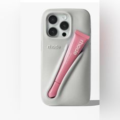 an iphone case with a pink toothbrush in it