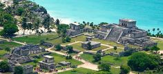 an aerial view of the ruins and beach