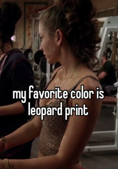 a woman standing in front of a gym machine with the words my favorite color is leopard print