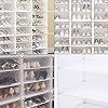 there are many pairs of shoes on the shelves next to each other in this room