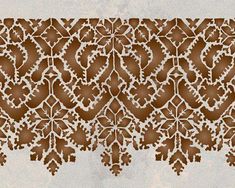 an intricately designed wall panel in brown and white