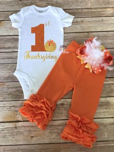 First Thanksgiving Baby Outfit!!! ***Celebrate your little one's first Thanksgiving with this gorgeous outfit design, it's perfect for photoshoot or just a holidays celebration! These cute ruffle pants are made of super soft and high quality fabric, Ruffle pants have an elastic waist band. Fabric is 95% cotton, 5% spandex You can include in this listing; * Bodysuit or shirt *Ruffle Legging Pants *Hair bow The top design is made with high quality glitter vinyl. ^_^ READY TO SHIP ^_^ Place your Or Thanksgiving Baby Outfit, Thanksgiving Outfit Kids, October Girl, Thanksgiving Baby Outfits, Girls Thanksgiving Outfit, Ruffle Leggings, Girls Thanksgiving, Thanksgiving Day Parade