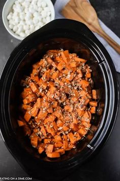 the food in the crock pot is ready to be cooked and put into the slow cooker