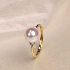 Akoya Pearl Diamond Ring, Gold Pearl Everyday Ring, Black Pearls Promise Ring, Tahitian Pearl Anniversary Ring, Black Pearls Statement Ring ✦PRODUCT DETAILS✦ → Main stone: Akoya Pearl 8.5-9mm → Side stone: Diamond ∼0.08ct ✦SPECIFICATIONS✦ MOISSANITE ✓ COLOR: D ✓ CLARITY: VVS1 ✓ CUT: EXCELLENT OR DIAMOND ✓ COLOR: F-G ✓ CLARITY: SI1-VS ABOUT US ♥ Our designer and craftsmen work to create and deliver the most refined pieces of jewelry to you. We carefully handpicked and sourced each gemstone to ens Engagement Rings Diamond And Pearl, Simple Pearl Engagement Ring, Pearl Wedding Ring Vintage, Pearl Promise Rings, Engagement Ring Pearl, Pearl Engagement Rings, Pink Diamonds Engagement, Heart Shaped Diamond Ring, Pearl Diamond Ring