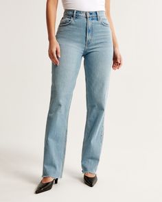 Our classic 90s straight jeans in a medium wash with a raw hem. This fit features an 11.5” ultra high rise, is fitted at top of body and eases through the thigh into a straight leg shape with a full-length inseam. Our Curve Love styles add an additional 2” at the hip and thigh to allow room for your curves and eliminate waist gap. This jean is made from our vintage stretch fabric which features both an authentic vintage look and contains slight built-in stretch for additional comfort. 90s Straight Jeans, Active Swimwear, Jeans Outfits, Women's Bottoms, Chic Woman, New Arrival Dress, Slim Jeans, Who What Wear, High Jeans