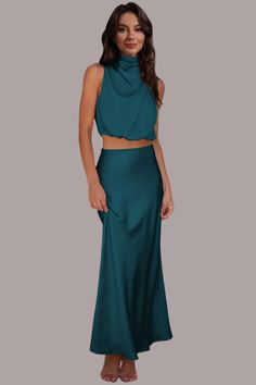 Transform your wardrobe with our GYPSY Cropped Turtle Neck Tank Top and Maxi Skirt Set. Experience elegant vibes with a casual kick, perfect for any occasion. Elevate your style with this must-have set! PRODUCT MEASUREMENTS (INCH) 🌗 SIZE BUST WAIST/bottoms HIPS SHOULDER LENGTH/bottoms XS S 37.8 24.6 35.9 M 39.8 26.5 36.3 L 41.7 28.5 26.7 XL 44.9 31.6 37.1 1X 2X MATERIAL: 100% polyester Stretch: No stretch Care instructions: Machine wash cold. Tumble dry low. Chic Green Maxi Skirt For Night Out, Chic Two-piece Green Skirt, Chic Green Two-piece Skirt, Elegant Vibes, Maxi Skirt Set, Deep Teal, Flower Child, Shoulder Length, Outfit Sets