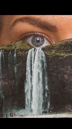 an eye looking at a waterfall with water falling from it