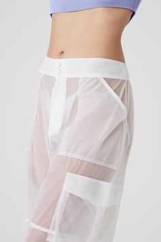 Disco dance all night or twirl through festival fields in these statement-making sheer pants. They have cool cargo pockets, drapey wide legs and a high-rise waist with a stretchy back to ensure a perfect fit. Crafted from mesh, they’re incredibly comfortable with a soft, fluid, lightweight feel. Layer them with leggings, biker shorts or a barely-there thong depending on your plans. Sheer Pants, Dance All Night, Disco Dance, Woman Back, Back Women, Wide Legs, Alo Yoga, Biker Shorts, New Look