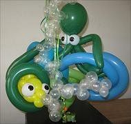 an inflatable balloon sculpture sitting on top of a table