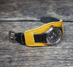 Limited edition leather watch band. Suitable for watches with lug widths 18mm, 20mm, 22mm, 24mm. The black strap paired with a yellow cuff is an original and eye-catching strap for a unique look.   Handmade cuff bund strap military style is durable, soft, does not stretch, fits perfectly on the wrist. This strap will definitely highlight the beauty of your watch and make it stand out from all the others.  Bund band is a combination band, made of two types of leather. Cuff made with conceria walp Leather Watch Bands With Adjustable Strap, Black Leather Cuff Watch Bands, Vintage Cuff Watch With Leather Strap, Custom Leather Watch Strap, Black Leather Strap Watch Bands, Brown Cuff Leather Strap For Watch, Leather Watch Band, Leather Ideas, Veg Tan Leather