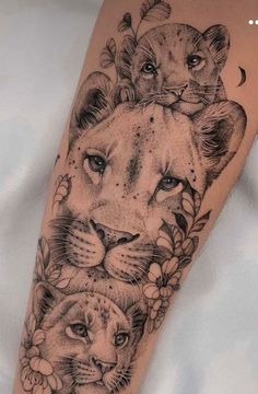 an arm with two lions and flowers on it