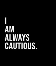 the words i am always cautious are white on black