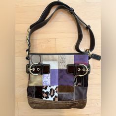 Coach Eva Holiday Edition Patchwork Purple And Brown Crossbody Purse. Worn Once. Excellent Condition. Vintage. Shoulder Strap And Protective Bag Included. Brown Crossbody Purse, Purple And Brown, Brown Crossbody, Coach Bag, Crossbody Purse, Coach Bags, Purses Crossbody, Shoulder Strap, Purse