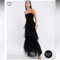 Black, Size 2, New With With Tags Never Worn. Ordered In 2 Sized And Went With A Different Size. Chic Tulle Evening Dress With Ruffles, Chic Ruffled Evening Gown, Evening Tiered Tulle Gown, Tiered Tulle Gown For Evening, Black Ruffled Maxi Dress For Wedding, Chic Tulle Evening Dress For Night Out, Chic Tulle Gown With Ruffles, Black Ruffled Maxi Dress For Gala, Chic Cocktail Gown With Ruffles