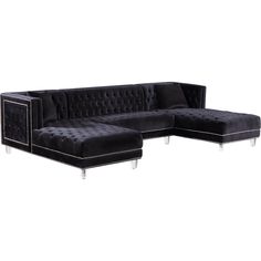 a black velvet sectional sofa with chrome legs and footrests on an isolated white background