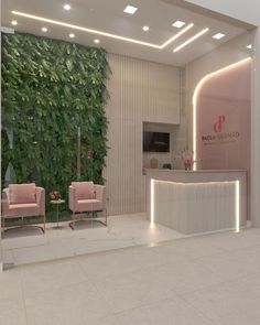 the interior of an office with plants growing on the wall and two pink chairs in front of it