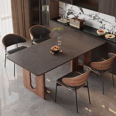 a dining room table with chairs around it