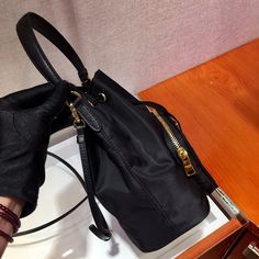 Size: 16cm*21cm*10cm It comes with Dust box, Care manual, Tag, and Paper bag. High-end Bucket Bag With Handles For Daily Use, High-end Bucket Bag For Daily Use, High-end Large Capacity Pouch Shoulder Bag, High-end Bucket Bag With Double Handle For Travel, High-end Travel Bucket Bag With Double Handle, High-end Double Handle Bucket Bag For Travel, High-end Satchel With Bucket Shape And Detachable Handle, High-end Bucket Satchel With Detachable Handle, High-end Bucket Bag With Detachable Handle For Everyday