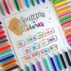 several different colored crayons next to each other on a sheet of paper with the words voltatass de colores written in it