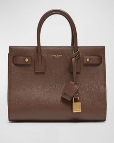 Get free shipping on Saint Laurent Sac De Jour Baby Top-Handle Bag in Grained Leather at Neiman Marcus. Shop the latest luxury fashions from top designers. Ysl Handbags, Trendy Purses, Fall Handbags, Tan Handbags, Tan Bag, Baby Top, Leather Roll, Bronze Hardware, Best Handbags