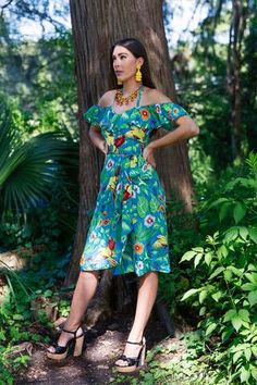 Drinking cocktails in your backyard or strolling the botanical gardens, our Jungle Parrot collection will... Havana Nights Outfit Women, Tiki Party Outfit, Tropical Dress Outfit, Caribbean Outfit, Jungle Parrot, Cuban Dance, Tiki Fashion, Parrot Dress, Caribbean Outfits