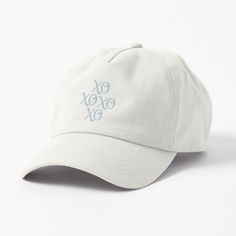 a white hat with the word exoxe xo embroidered on it