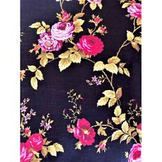 a black background with pink and yellow flowers