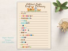 children's books and dictionary printable stickers on a table next to a potted plant