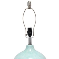 a light blue glass lamp with a black cord attached to the base and a silver metal holder