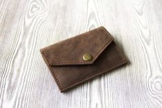 wallet.⭐️Search more designs by the link➡️ https://www.etsy.com/shop/EveUa?ref=search_shop_redirect&section_id=24030401If you want to add personalization on leather product ,please click the link belowhttps://www.etsy.com/listing/651339348/personalizationpersonalized?ref=listings_manager_grid Leather coin pouch will added your everydey look and save your cards and coins safetyDMENSIONSSlot for coinSlot for 3 cardsSIXE 10*8sm PERSONALIZATIONIf you want to make any engraving, just contact us i Small Wallets For Women, Leather Coin Pouch, Small Leather Wallet, Leather Portfolio, Leather Product, Brown Wallet, Leather Laptop Bag, Clip Wallet, Coin Wallet