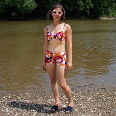 "Adorable bikini set with shorts and underwire top. The straps are adjustable and the print is super fun and abstract. Fully lined, with undies under the shorts. All elastic is still functional. By the brand Bali, Union made in USA Tagged a size 36C -fits Medium to Large best. Bust: 36\" Waist: 28\"-34\" Hip: 32\" - 40\" Rise: 10\" Condition: Excellent, no visible damages" Multicolor Swimwear With Built-in Shorts For Pool, Multicolor Short Length Swimwear For Pool, Retro Underwire Swimwear For Poolside, Summer Swimwear With Built-in Bra, Short Length, Multicolor Underwire Swimwear With Built-in Bra, Retro Underwire Swimwear For Vacation, Beachwear Multicolor Swimwear With Built-in Bra, Multicolor Beachwear Swimwear With Built-in Bra, Retro Swimwear For Beach In Short Length