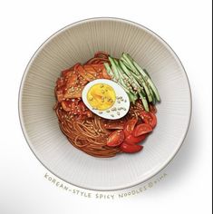 a white bowl filled with noodles and an egg on top of it's side