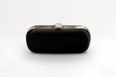 The Black Bella Clutch is a duchess satin designer bridal and evening clutch, perfect for a divine, fancy black-tie occasion on your calendar! The Black Bella Clutch makes a statement! Designed with a contemporary vision, the Black Bella Clutch is made of duchess satin and crafted by the finest Italian artisans. The perfect accessory to complete a refined and glamorous black-tie outfit, The Black Bella Clutch will become a staple in your wardrobe. Paired best with silver hardware! The Bella Clut Sophie Bush, Black Tie Outfits, Custom Handbags, Heirloom Wedding, Duchess Satin, Bridal Clutch, Clutch Black, Designer Clutch, Couture Bags