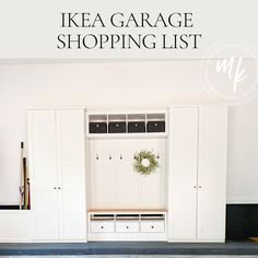 an ikea garage shopping list with white cabinets and wreath on the wall above it