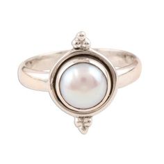 The luminous purity of a cultured white pearl takes center stage on this sterling silver ring from India's Rakesh Rana. The pearl is set on a simple band with a bead-accented bezel. Elegant White Pearl Ring With Bezel Setting, Adjustable Classic Pearl Ring, Minimalist Adjustable Pearl Ring For Formal Occasions, Classic Pearl Stackable Rings, Classic White Pearl Ring With Pearl Charm, Classic White Pearl Ring With Charm, Classic Sterling Silver Pearl Drop Ring, Classic Stackable Moonstone Ring, Stackable Adjustable Pearl Ring With Round Band