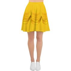 This gorgeous skater skirt features an illustration of draped yellow fabric inspired by Belle's ball gown in Beauty and The Beast. This light and stretchy skirt is perfect for a princess running costume for racing to the castle.The soft fabric and flared cut of this skater skirt are just a few of the reasons why it's bound to become a favorite in your wardrobe. The flattering silhouette looks great on any body type, and thanks to the elastic waistband, you'll feel extra comfy.• 82% polyester, 18 Yellow Ball Gown, Princess Running Costume, Running Costumes, Stretchy Skirt, Easy Halloween Costumes, Yellow Fabric, The Castle, A Princess, Golden Yellow