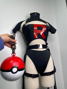 Pokemon costume perfect for halloween. Avialble with removable sticker or vinyl permanent print. Custom made to your measurements. #teamrocket #jessiecostume #pokemoncostume #teamrocketcostume #halloweenpokemon Pokemon Rave Outfit, Pokemon Costumes Women, Rave Costume Ideas, Team Rocket Outfit, Team Rocket Costume, Pokémon Costume, Pokemon Jessie, Team Rocket Cosplay, Jessie Costume