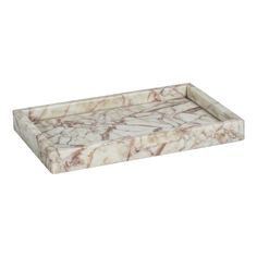 a marble tray with white and brown designs on the bottom, sitting in front of a white background