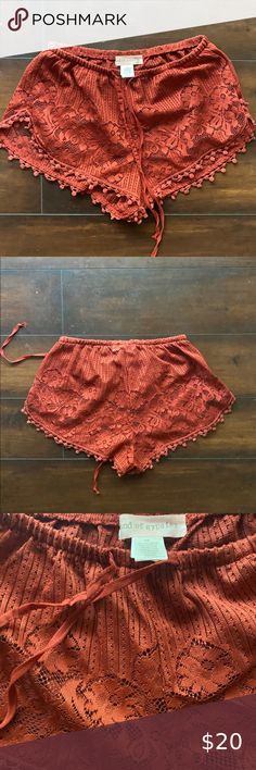 Band of Gypsies Rust Lace Shorts New never worn rust colored lace shorts. See through around the lace bottom. Cute bathing suit coverup or just roaming the streets. Band of Gypsies Shorts Bermudas Bohemian Stretch Short Bottoms, Bohemian Style Fitted Short Bottoms, Red Beachwear Bottoms For Loungewear, Red Beachwear Loungewear Bottoms, Red Bohemian Shorts For Spring, Red Short Length Bottoms For Festival, Red Short-length Bottoms For Festival, Bohemian Red Loungewear Bottoms, Red Bohemian Spring Shorts