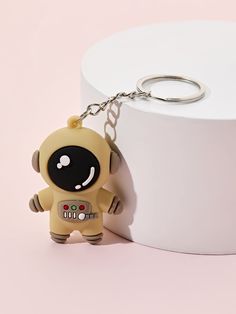 a key chain with a cartoon character on it