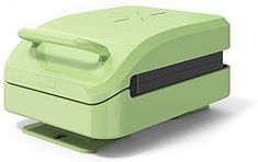 a green lunch box sitting on top of a white table