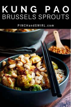 a bowl filled with broccoli and beans next to chopsticks