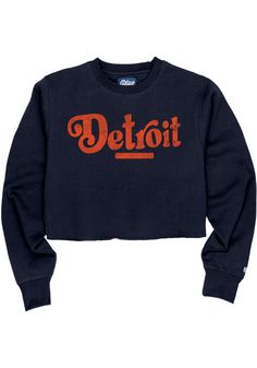 Make your way to the big game in this DetroitWomens Navy Blue Coopeer Hippie Font Crew Sweatshirt! This Detroit Long Sleeve Sweatshirt features a screen print graphic. Stay warm and comfortable with this Womens Detroit Local Stuff Shop Detroit Crew Sweatshirt. Dual blend fabrication, Raw edge hemline, Neckline binding, Sleeve cuffs, Softhand, 55% POLYESTER / 45% COTTON, 4 Vintage Navy Top For Fall, Blue Varsity Style Tops, Navy Varsity Top For Fall, Navy Tops For College In Fall, Vintage Tops For College, Blue Tops With Ribbed Cuffs For Game Day, Retro Blue College Sweatshirt, Retro Blue Crew Sweatshirt, Navy Sporty Sweatshirt With Logo Print