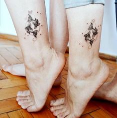 two people with matching tattoos on their legs